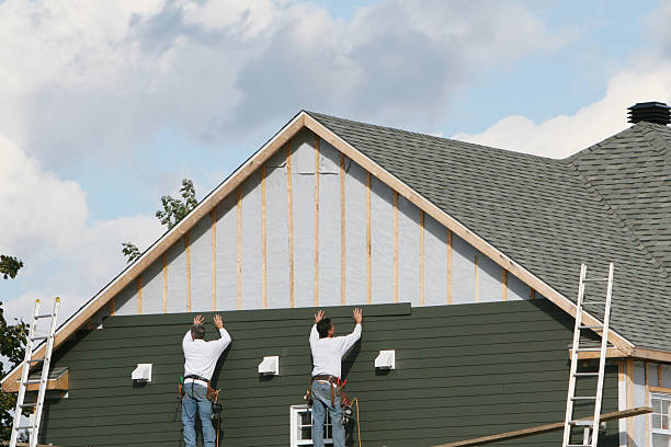 Professional Siding technician working in Winfield, TN
